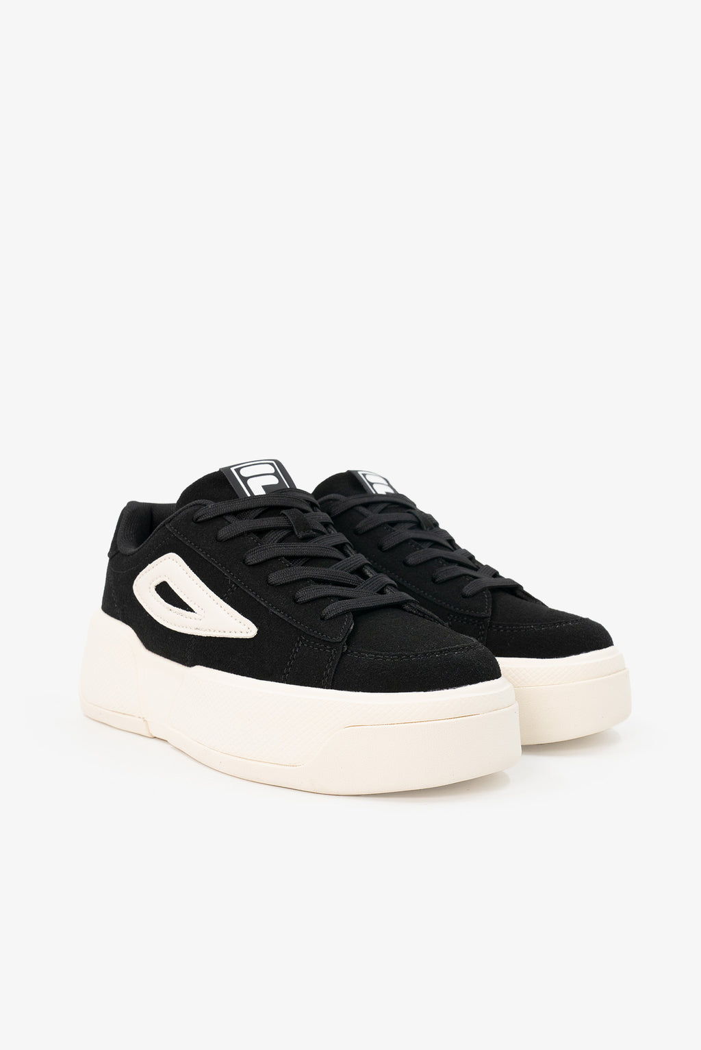 Black sneakers with white soles on a white background