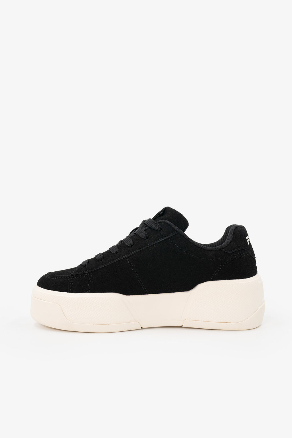 Black platform sneakers on a white background