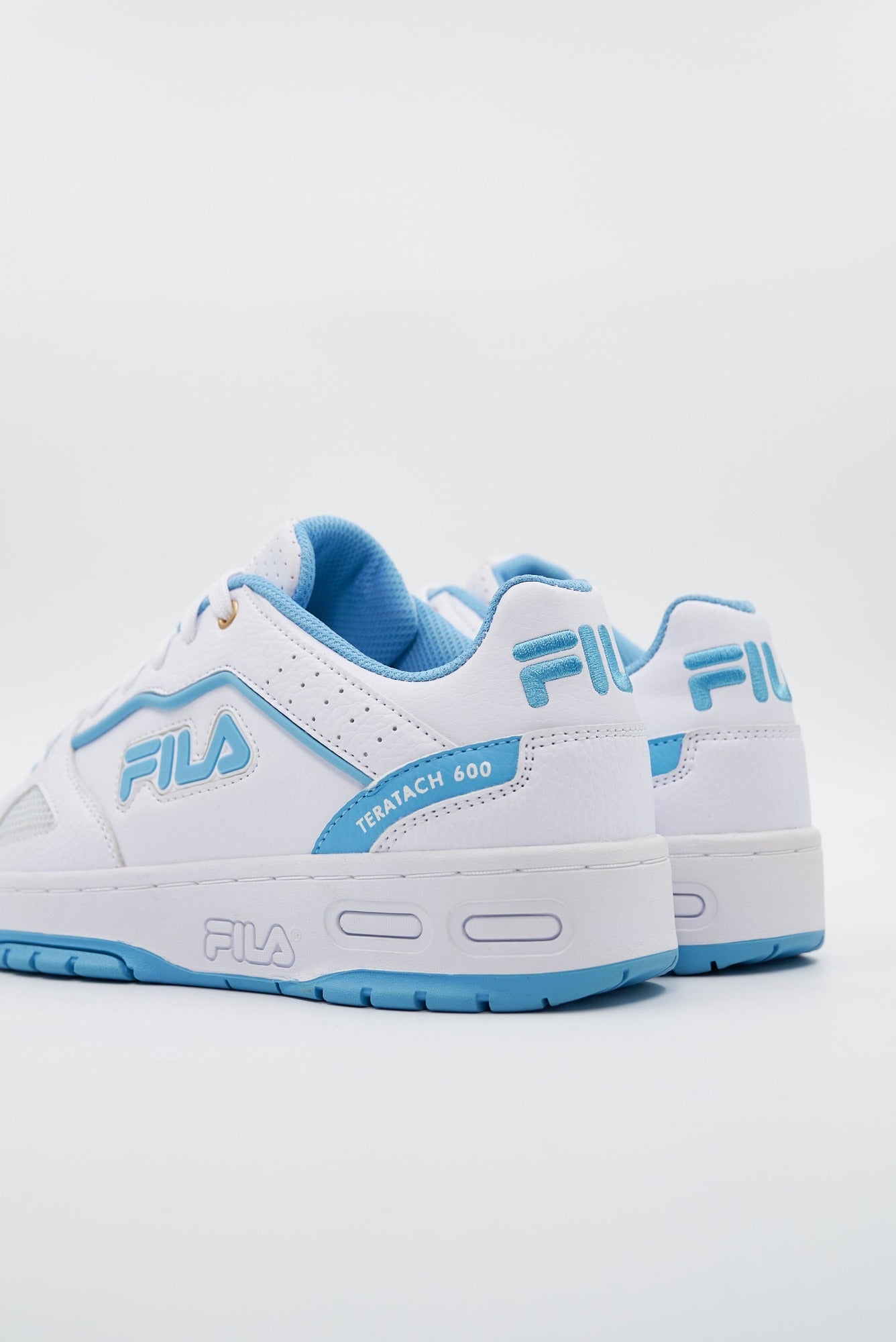 Blue and white sales fila shoes